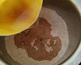 A picture of step 6 of Eggless Layered chocolate strawberry orange cake.