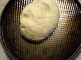 Pizza de cebolla y quesos