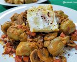 Foto del paso 11 de la receta: Alcachofas con champiñón, jamón y huevo poché