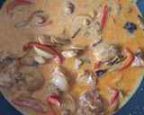 A picture of step 4 of Spiced coconut chicken.