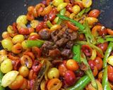 A picture of step 3 of Karonda pickle.