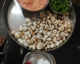 A picture of step 1 of Makhana matar.