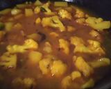A picture of step 3 of Cauliflower with potatoes and peas.