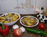 Foto del paso 6 de la receta: Patatas guisadas con chirlas y calamar