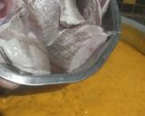 A picture of step 5 of Coconut fish curry.