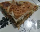 A picture of step 8 of Muttabaq style pie.