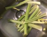 A picture of step 1 of Celery Gratin with Ham, Red Peppers, and Parmesan.