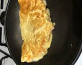 Foto del paso 6 de la receta Tortilla francesa rellena de bacon y queso