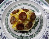 Foto del paso 7 de la receta: Butifarra al curry con huevo revuelto