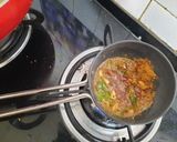 A picture of step 4 of Schezwan sandwich dosa.