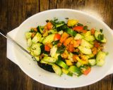 A picture of step 2 of Cucumber salsa🥒🍅🍋.