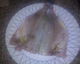 Foto del paso 4 de la receta Dorada al horno con cebolla y pimientos