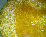 A picture of step 4 of Dafadukar shinkafa mai daddawa da dafaffen kwai da nama.