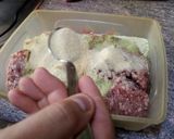 A picture of step 2 of Meatballs with Tomato Sauce.