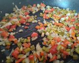 A picture of step 3 of Chicken Paella.