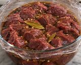 A picture of step 1 of Instant Pot Beef Mechado.