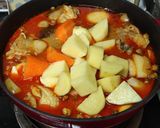 A picture of step 6 of Chicken Massaman Curry.