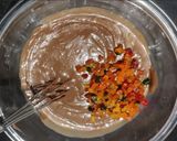 A picture of step 4 of Banana tutti fruity chocolate cake.