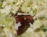 A picture of step 1 of Beer Brats and Cabbage.