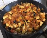 Une image de l'étape 9 de Chipolatas au curry d'aubergine et tomates.