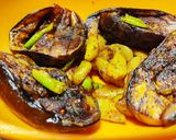 A picture of step 7 of Stuffed brinjal with potatoes.