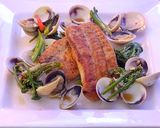 A picture of step 8 of Pan fried sea bream with sake braised clams and broccolini.
