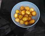 A picture of step 1 of Kashmiri Dum Aloo.