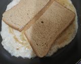 A picture of step 2 of Bread omelet with cheese.
