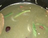 A picture of step 3 of Palak peas pulao.