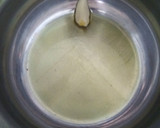 Foto del paso 8 de la receta: Calamares de Potera en su Tinta con Arroz Blanco de Grano Largo