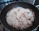 Foto del paso 7 de la receta: Arroz con azafrán y calamares