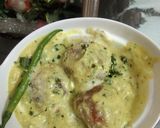 A picture of step 14 of Malai kofta in white gravy.