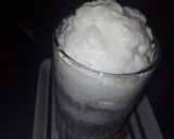 A picture of step 5 of Home made vanilla ice cream with some chocolate chips.