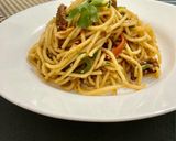 A picture of step 8 of Thai style beef noodles.