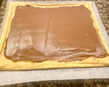 Foto del paso 7 de la receta: Brazo de gitano relleno con queso mascarpone y Nutella
