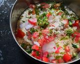 A picture of step 4 of Besan onion tomato chilla.