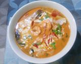 A picture of step 7 of Tom Yum Kung (Thai Hot and Sour Shrimp Soup).