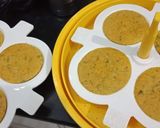 A picture of step 11 of Masala Oats Idly.
