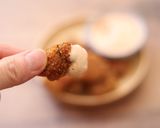 A picture of step 5 of Air fry chicken tots.