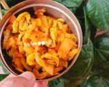 A picture of step 6 of Snake Gourd / Padwal sabji.