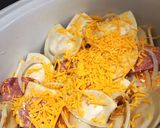 A picture of step 1 of Cheddar Pierogies in the Crockpot (Easy).