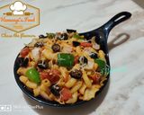 A picture of step 9 of Indian style macaroni pasta.