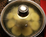 Foto del paso 6 de la receta: Almejas con cardos y patatas en crema verde y almendras