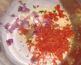 A picture of step 1 of Spicy Rice,carrot pancakes.
