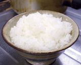 A picture of step 5 of Boiled white rice, used a pot with lid.