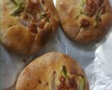 A picture of step 7 of Paneer stuffed foccasia bun.
