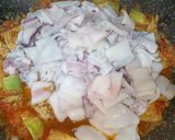 Foto del paso 6 de la receta: Guiso de papas con calamarcitos