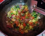 A picture of step 2 of Kanda batata poha.
