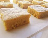 A picture of step 11 of Mango Blondie Bars with M&Ms.