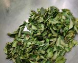 A picture of step 4 of #cook pad india#Curry leaves rice go with cucumber raitha.